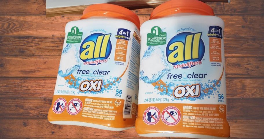 All Mighty Pacs Laundry Detergent w/ OXI Stain Removers & Whiteners 56-Count 2-Pack on counter