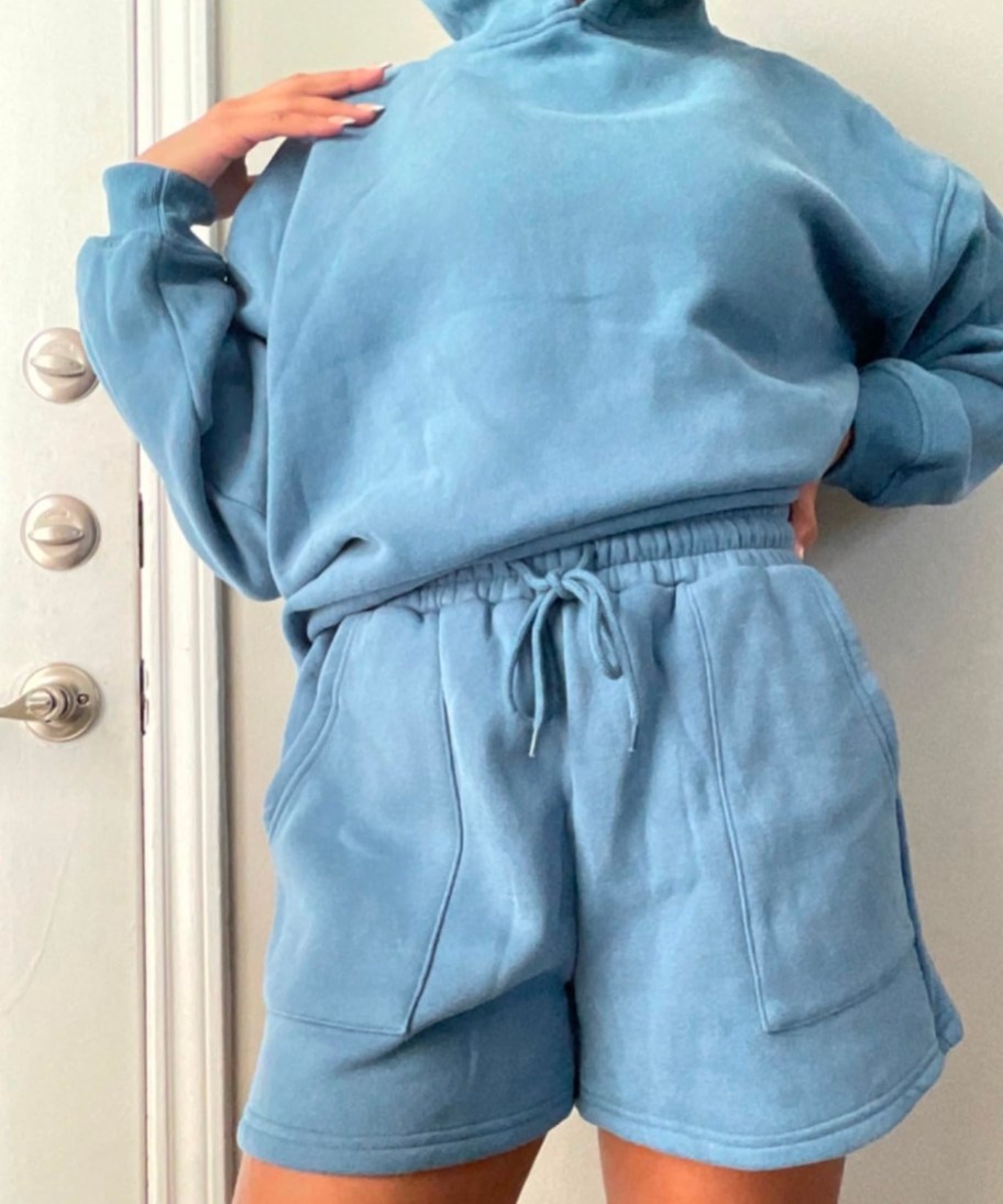 woman wearing Prinbara Women’s 2-Piece Hoodie Sweatshirt & Shorts Lounge Set in blue