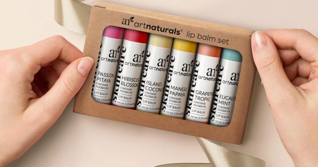 package of Art Naturals Lip Balms surrounded by white ribbons