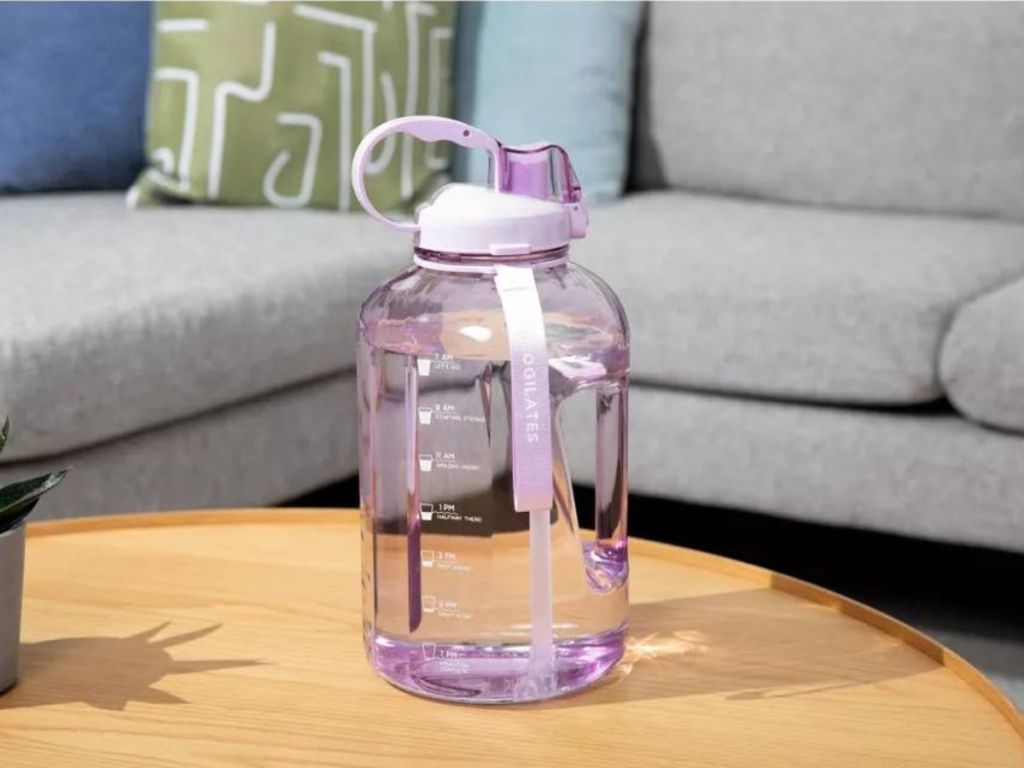 purple water jug on table