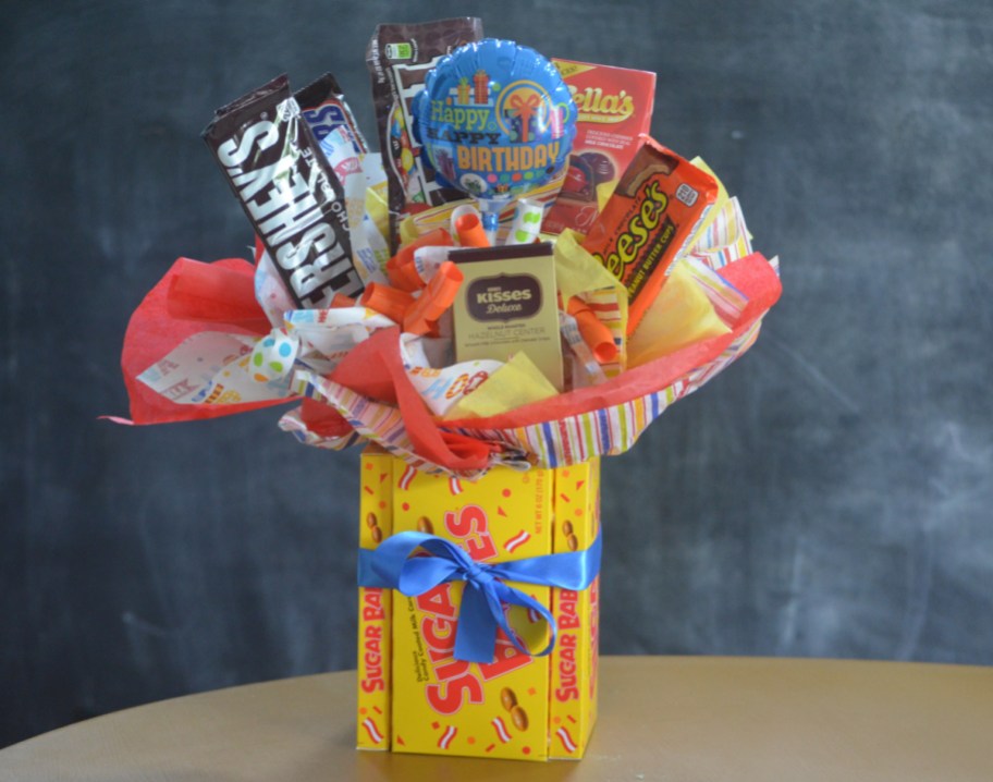 A candy bouquet diy birthday gift on a table