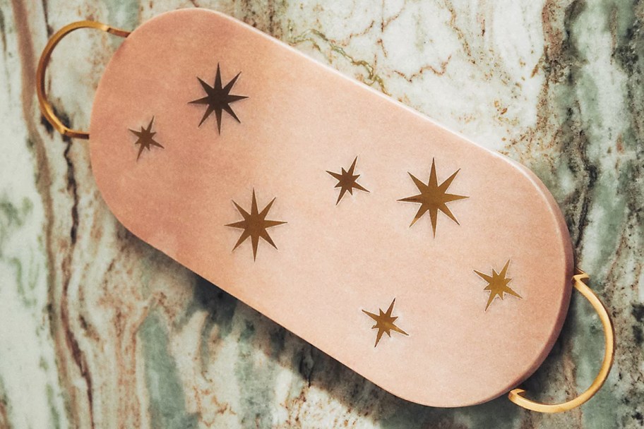 pink marble bar board with gold star details