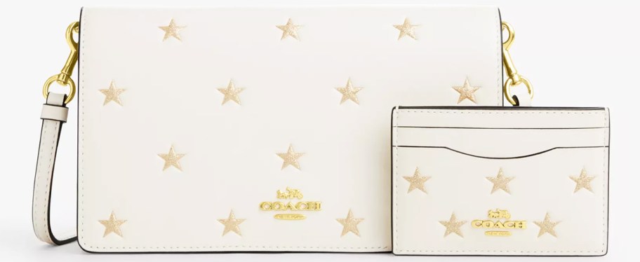 white crossbody with gold star print and matching card case