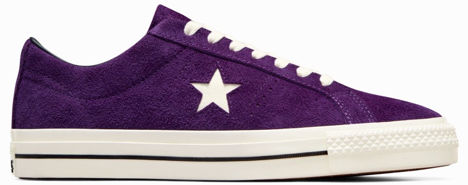 purple suede sneaker with shit star