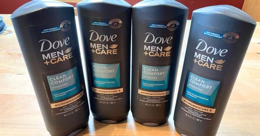 4 Bottles of Dove Men's Body Wash on a table