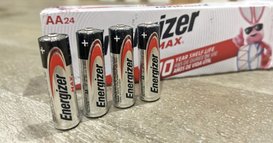 4 Energizer AA Batteries in front of 24-pack box