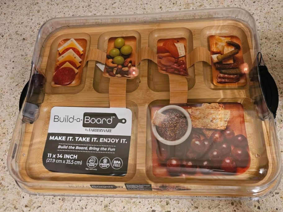 FARBERWARE Build-a-Board Cutting Board with Compartments and Clear Locking Lid for Charcuterie in packaging