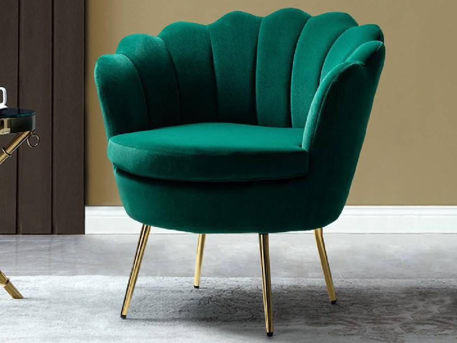 Green velvet chair with gold feet