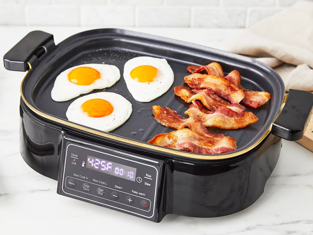 cooking eggs and bacon on a GreenPan Multi-Cooker