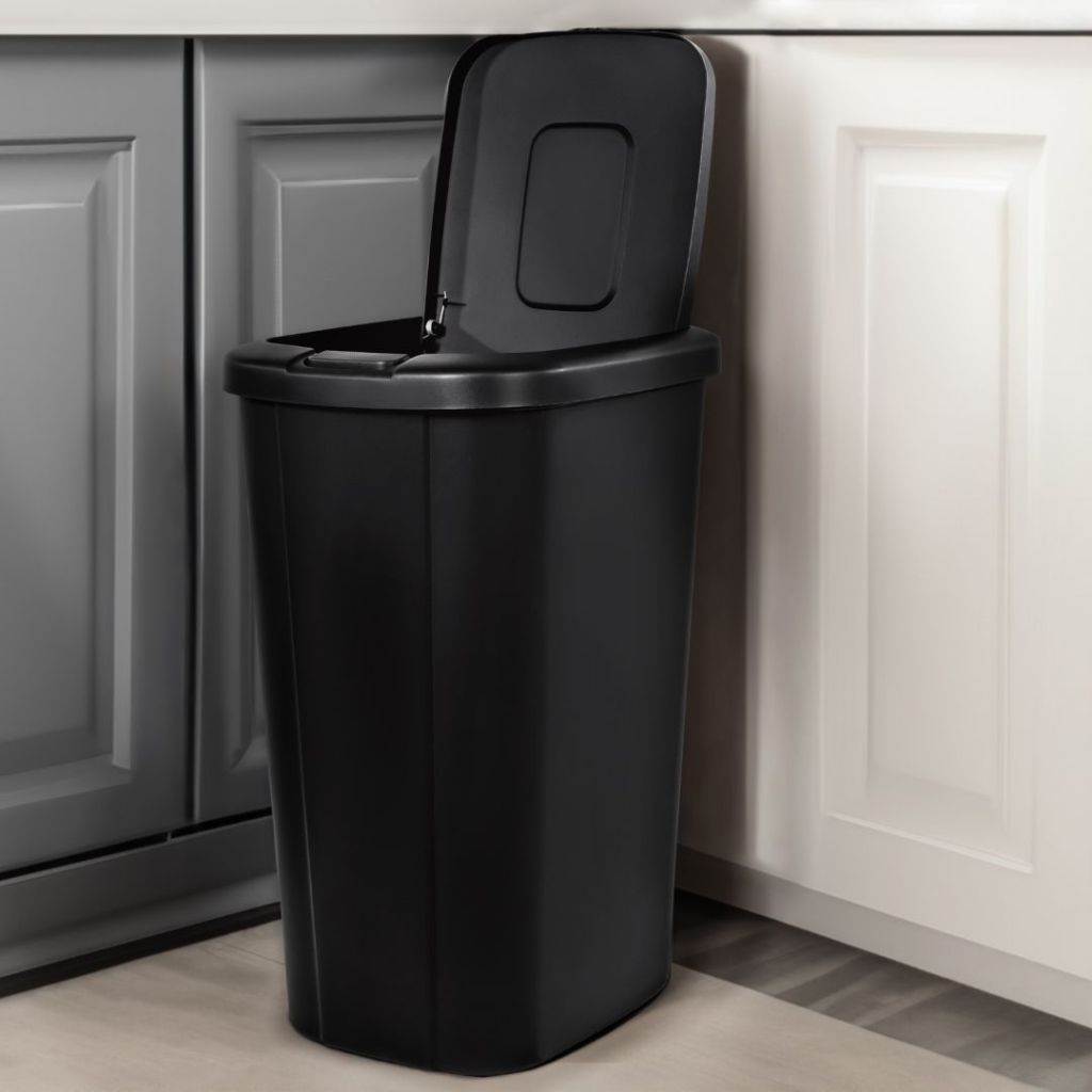 black Hefty touch top plastic kitchen trash can in kitchen with lid open