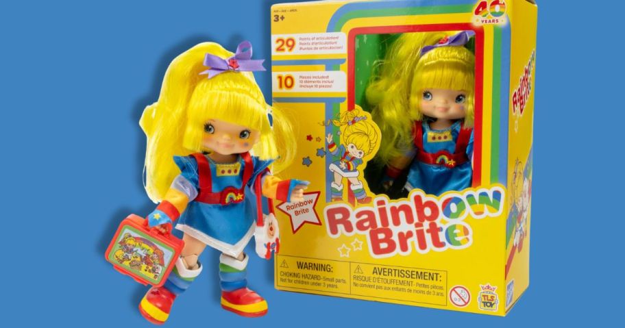 small Rainbow Brite Doll with accessories beside a box with another doll in it
