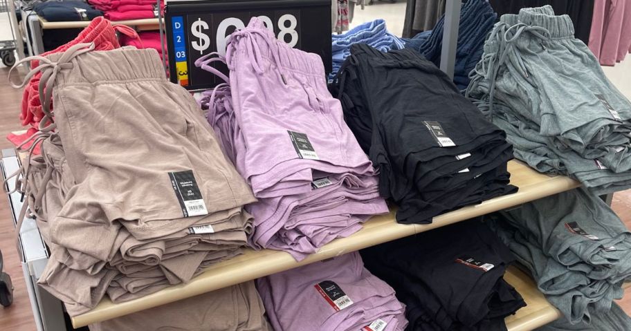 display table at Walmart with various colors of women's athletic shorts