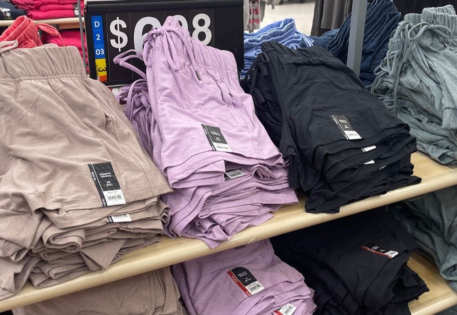 display table at Walmart with various colors of women's athletic shorts