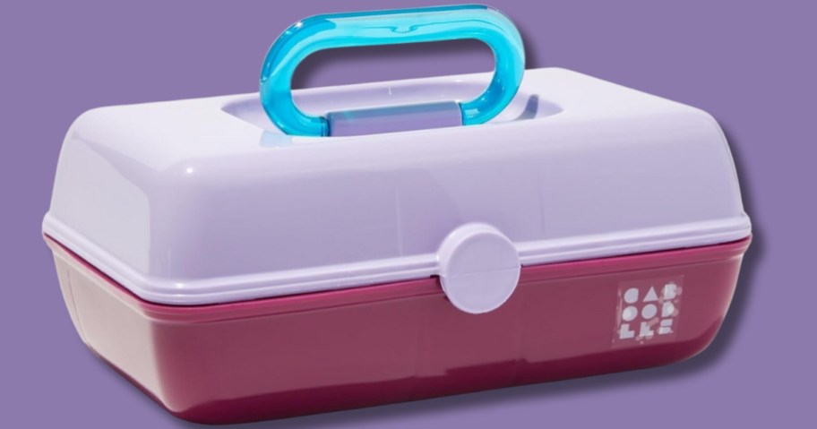light purple and dark pink caboodles makeup case with blue handle