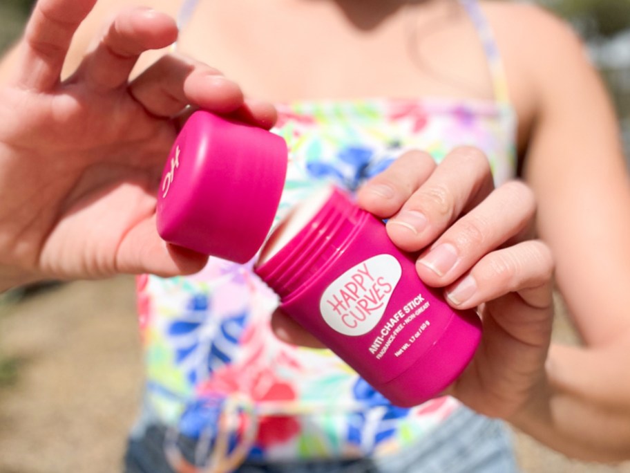 hands opening pink Happy Curves Anti-Chafe Stick
