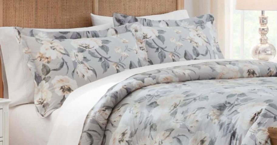 A Home Decorators Collection Sofia 3-Piece Gray Floral Comforter in a room