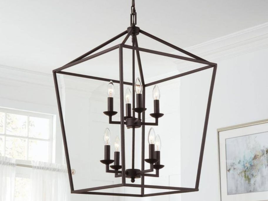 A bronze farmhouse style hanging chandelier