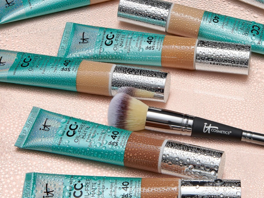 It cosmetics oil free foundation displayed in multiple colors with a brush