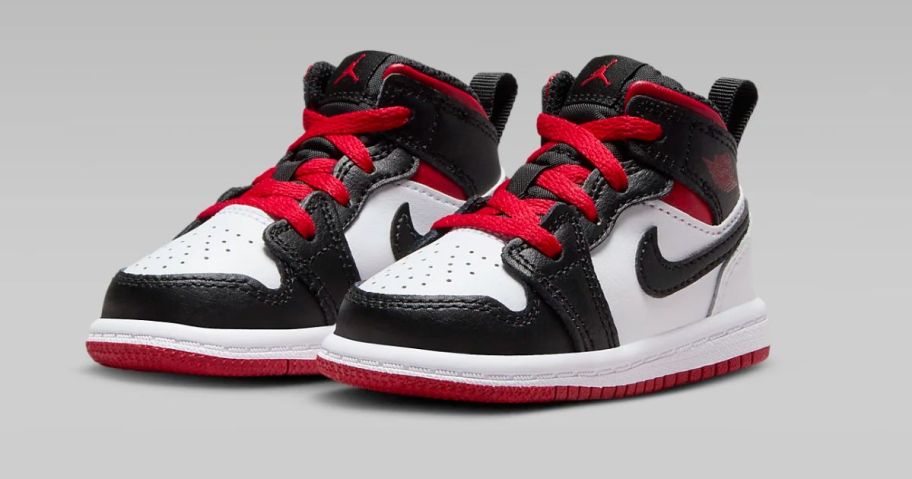 white black and red nike shoes