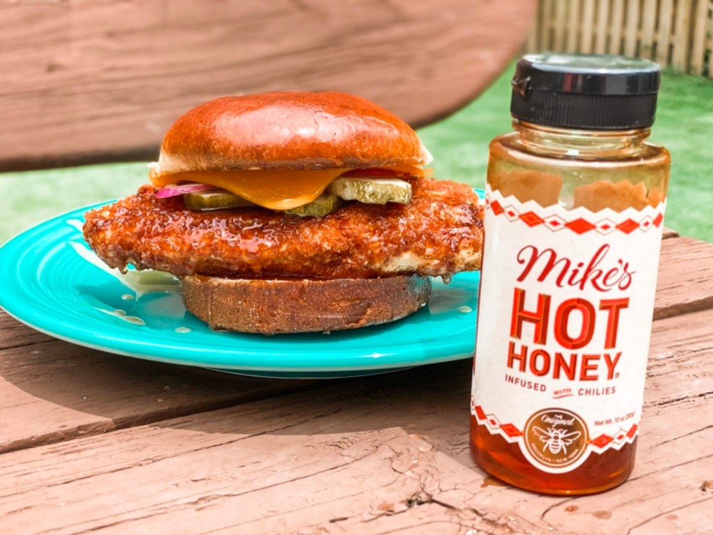 Mike's Hot Honey 10oz Bottle with chicken sandwich