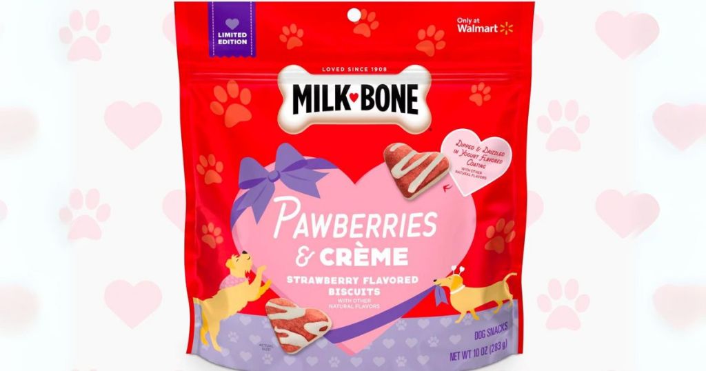 Milk bone pawberries and creme bag on a pink and white heart and paw print patterned background