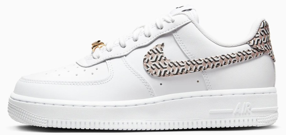 white nike sneaker with patterned logo