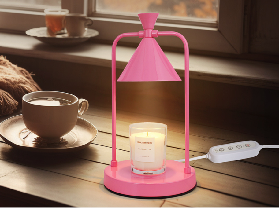 Ohenjoy Candle Warmer in pink on a desk