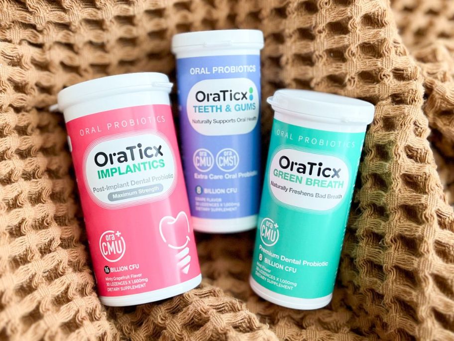 3 bottles of different varieties of OraTicx