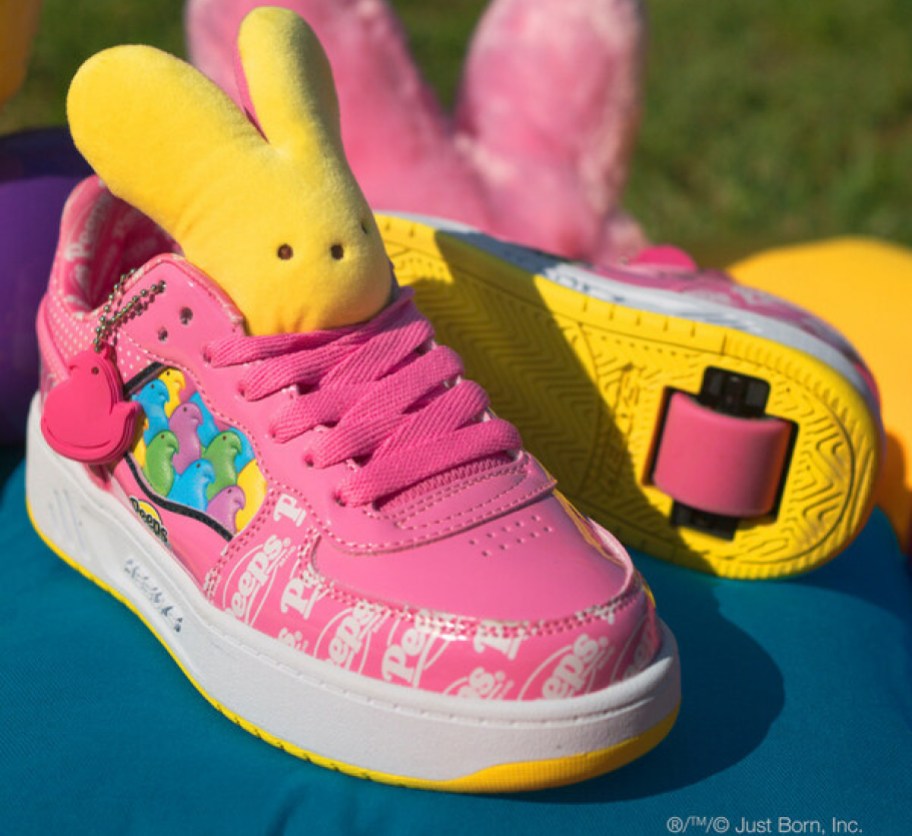 a pair of pink PEEPS x Heely Shoes