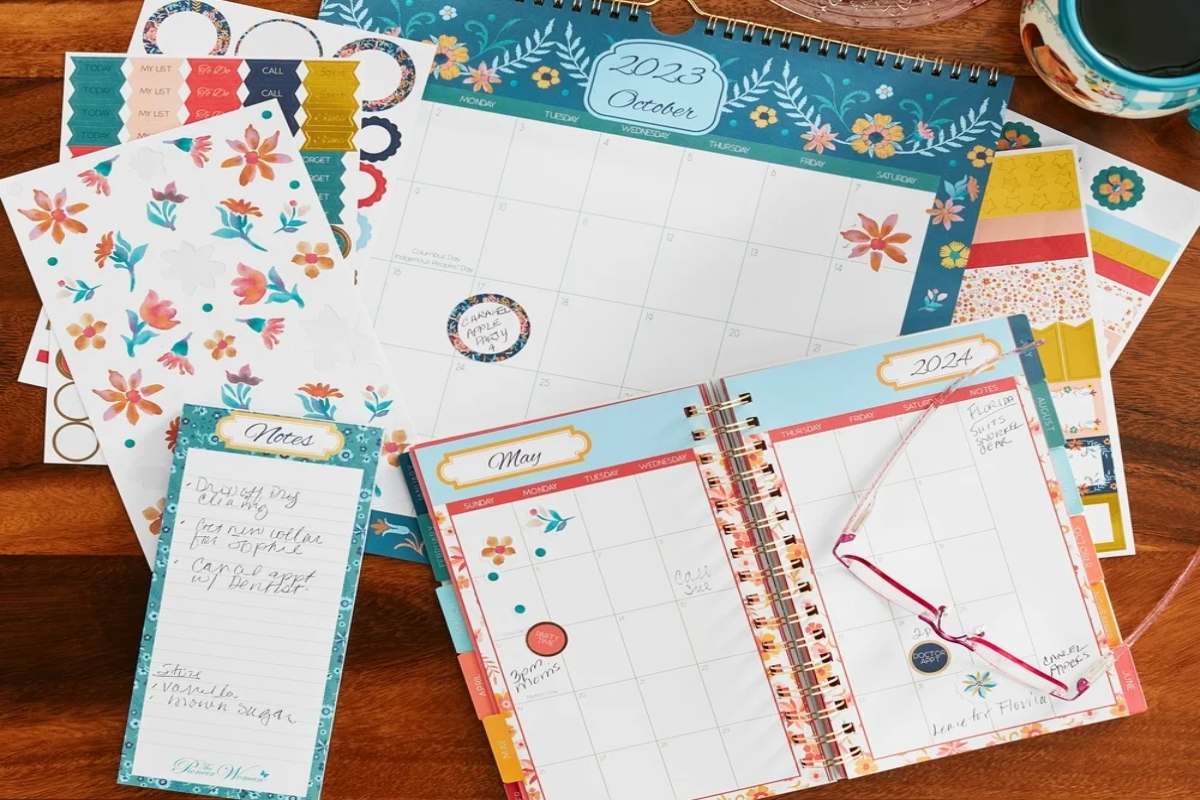 Pioneer woman Calendar set with all items spread out on a wooden table.