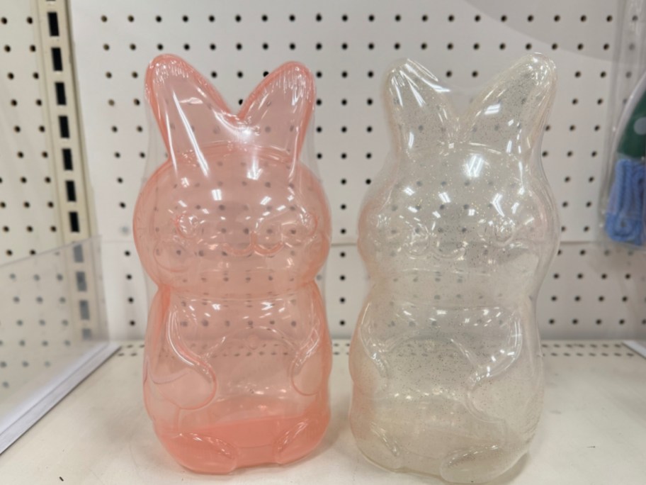 Plastic Bunny Containers in pink and white displayed on a shelf at the Target store