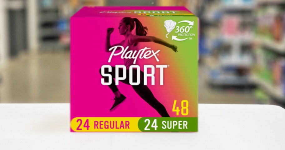 box of playtex sport tampons on white table in store