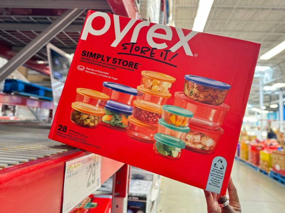A hand holding a box of Pyrex Simply Store