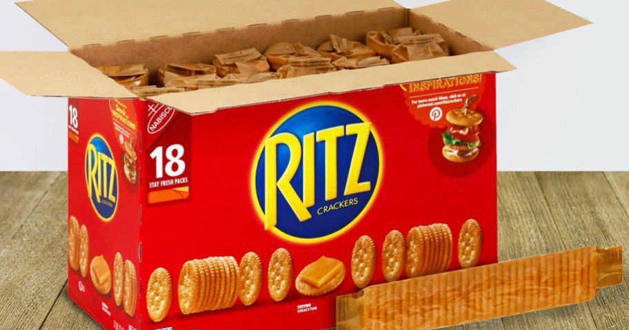 large opened red box of Ritz Crackers with sleeves of crackers inside