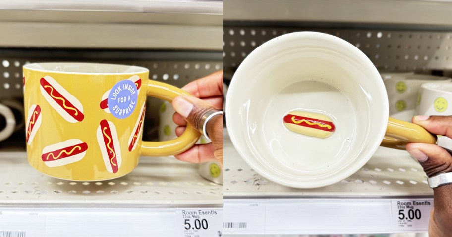 hand holding a hot dog print mug with a tiny hot dog inside at the bottom