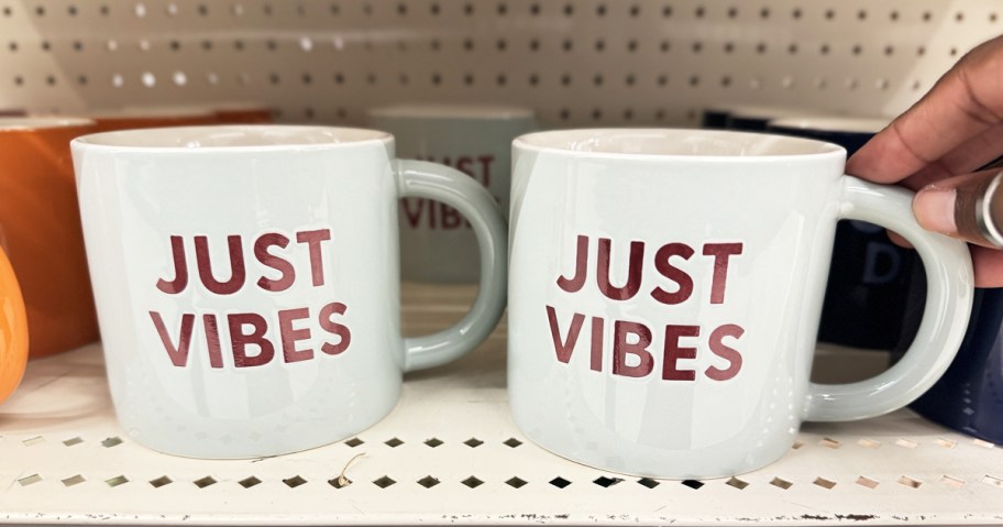 two white mugs that say "Just Vibes"