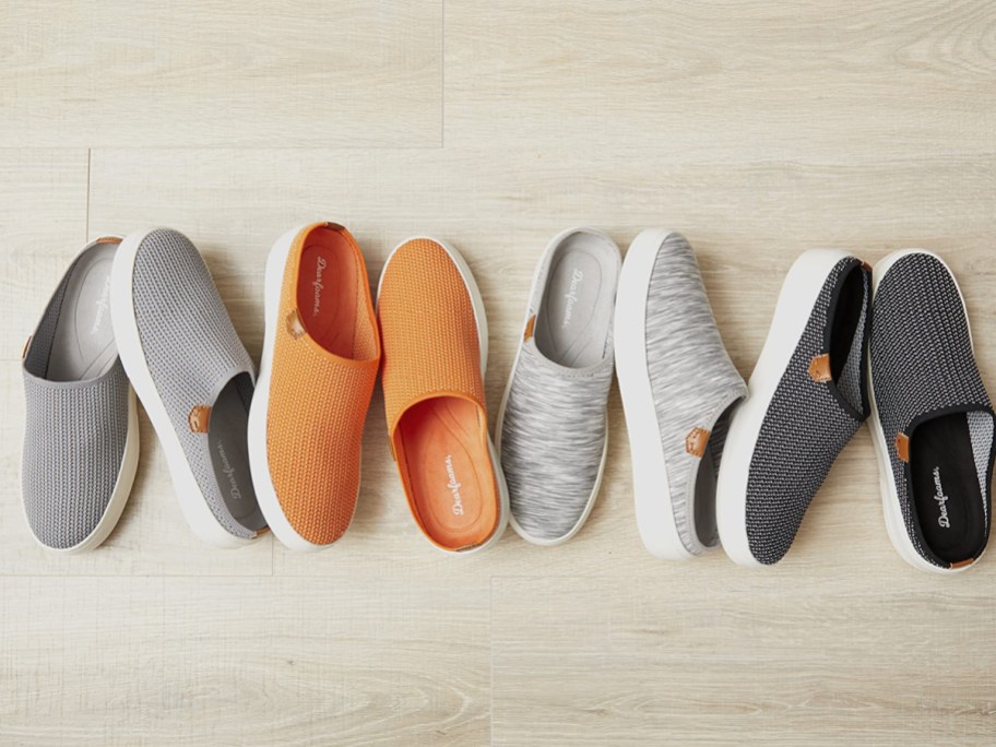 Row of different color dream foam slip shoes