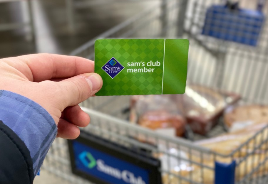 hand holding up a Sam's Club Membership Card