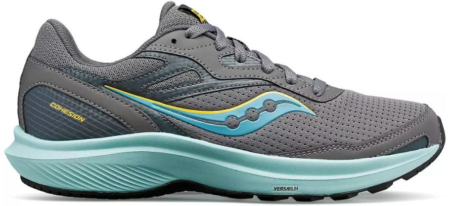 a gray and turquoise womens running shoe