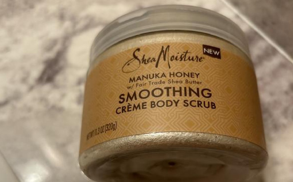 SheaMoisture Smoothing Body Scrub on a marble table