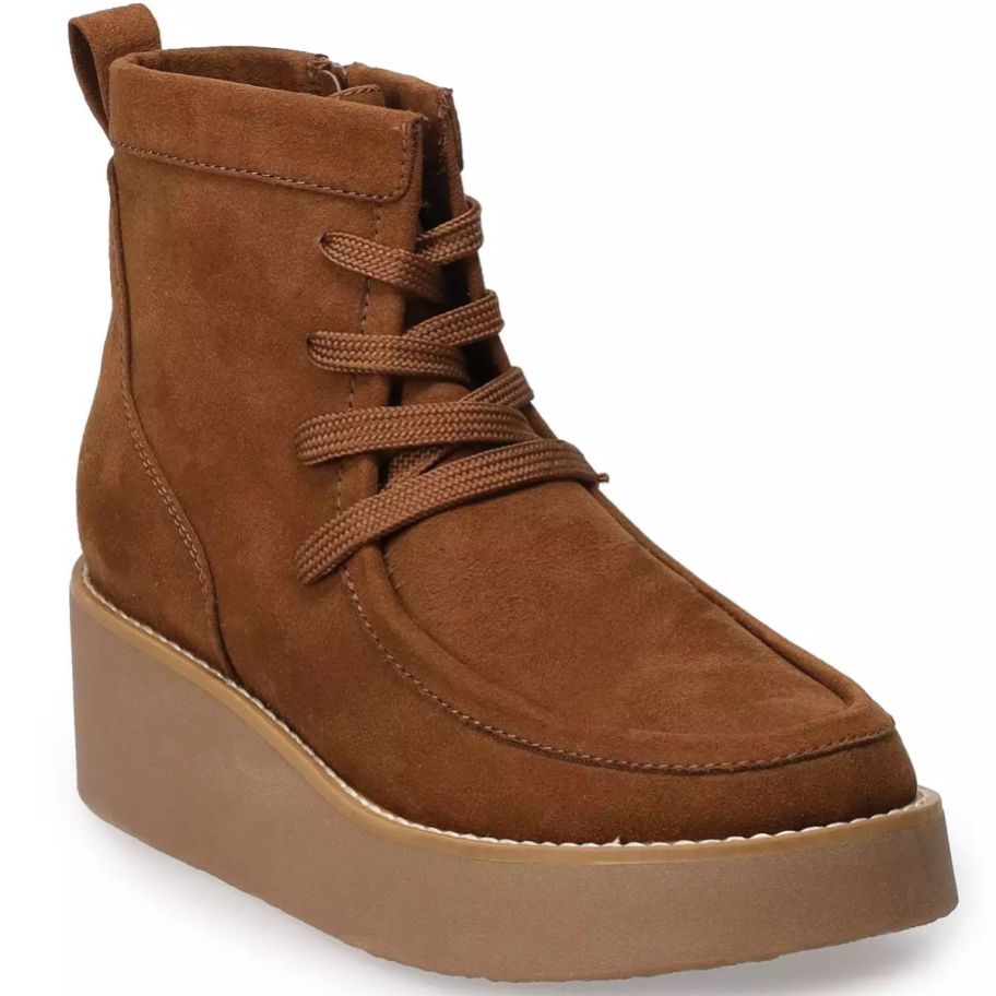 a brown platform lace up ankle boot