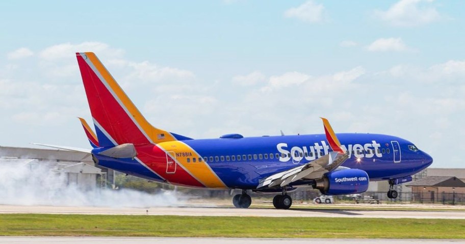 Southwest Airlines plane making touchdown on runway