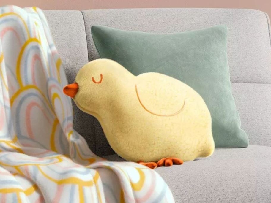 Target Room Essentials Easter Chick Pillow on a couch