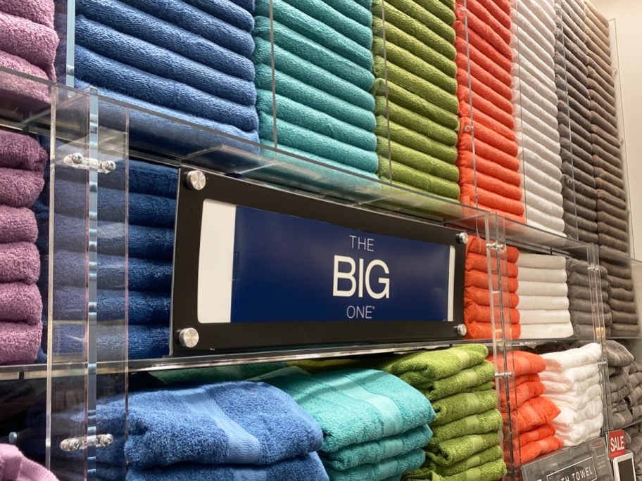 store display wall full of The Big One bath towels in various colors