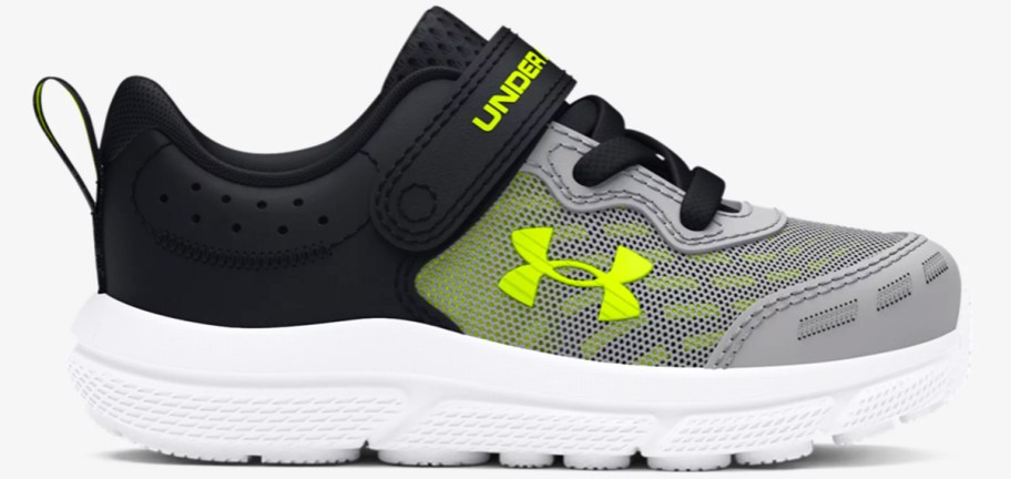 black, grey, and bright yellow under armour running shoe