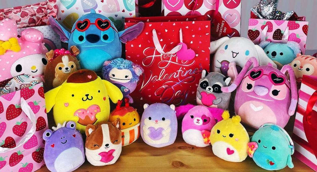 Valentines Day squishmallows displayed with gift bags
