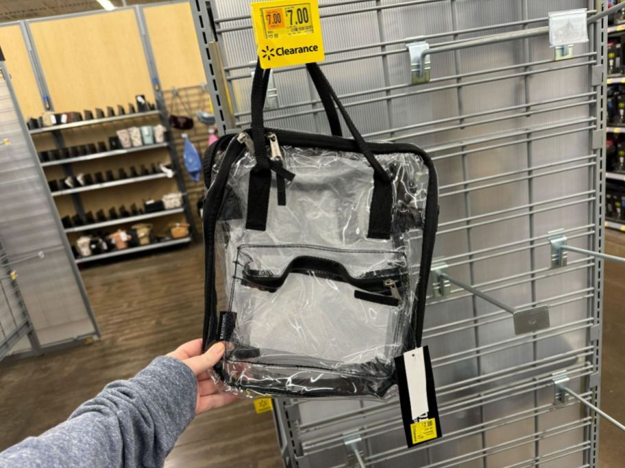 An Eastsport clear backpack in a store