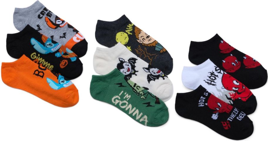 Stock images of three 3-packs of Halloween character socks from Walmart