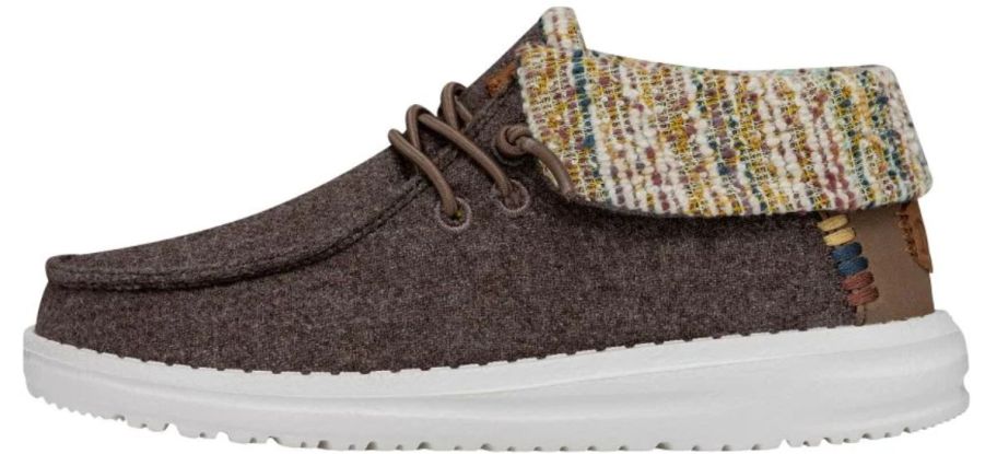 a brown boot with a fold down collar