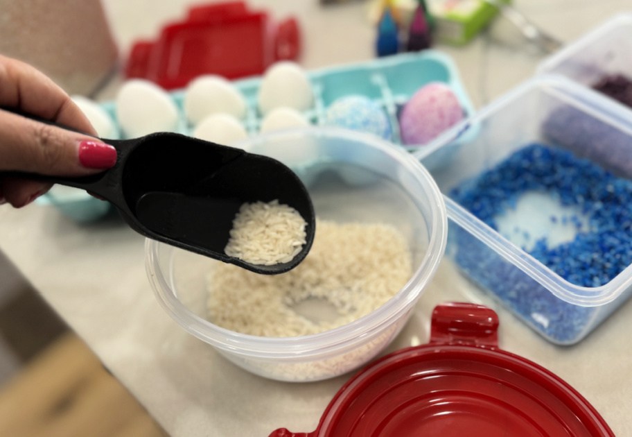 adding rice to a plastic container